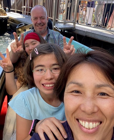 A family in a roller coaster car