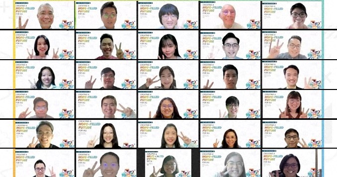 A screenshot of people’s smiling faces at an online meeting