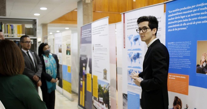 People viewing exhibition panels