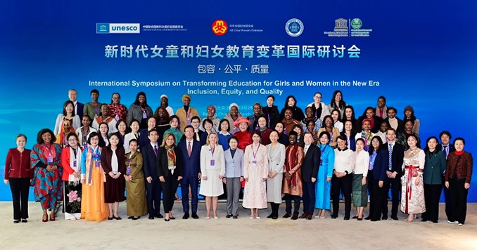 Group photo of some 50 diverse men and women