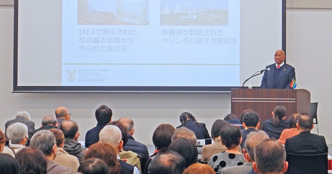 A man standing on the podium and giving a speech.