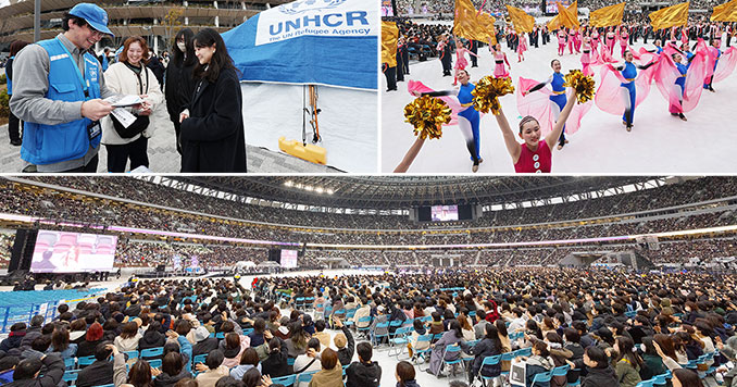 Festival participants and performers at a national stadium