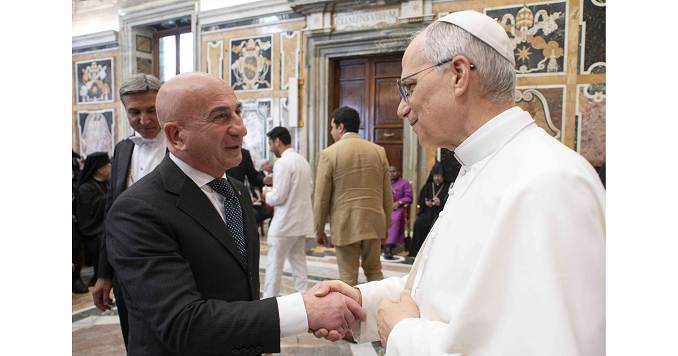 Two men shaking hands.