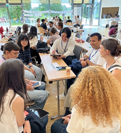 Young people holding small group discussions.