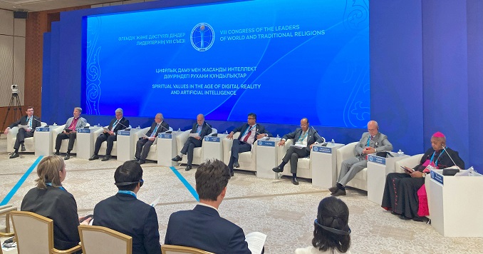 A panel discussion at a large interfaith event.
