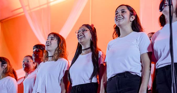 Young performers singing at a youth festival.