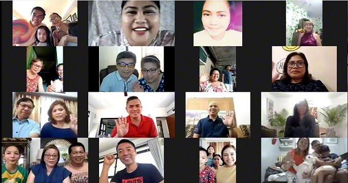 A screenshot of several smiling people in a virtual meeting 