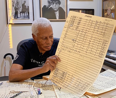 Wayne holding the score of “Iphigenia”