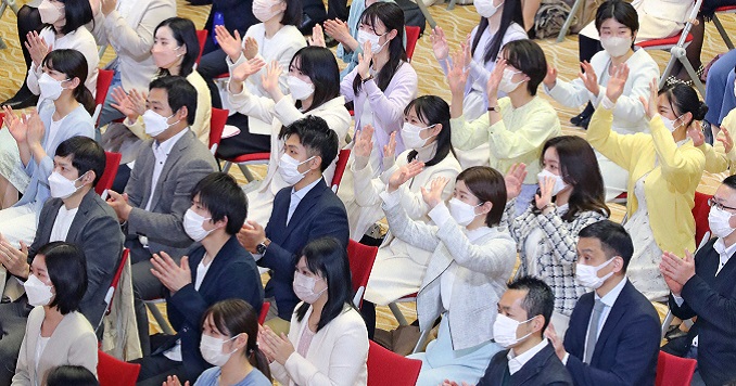 Young people participating a meeting