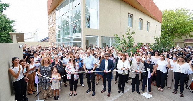 Large group of people standing in front of a building