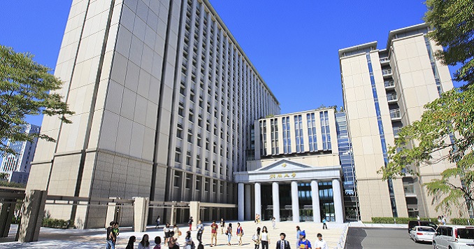 Large university building and blue sky