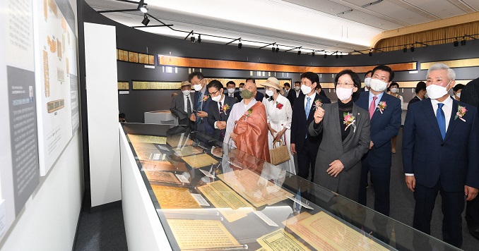 Visitors viewing exhibition panels