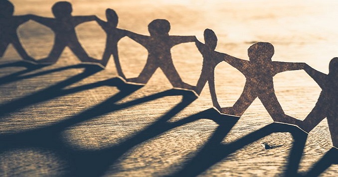 Paper cutout of a human chain